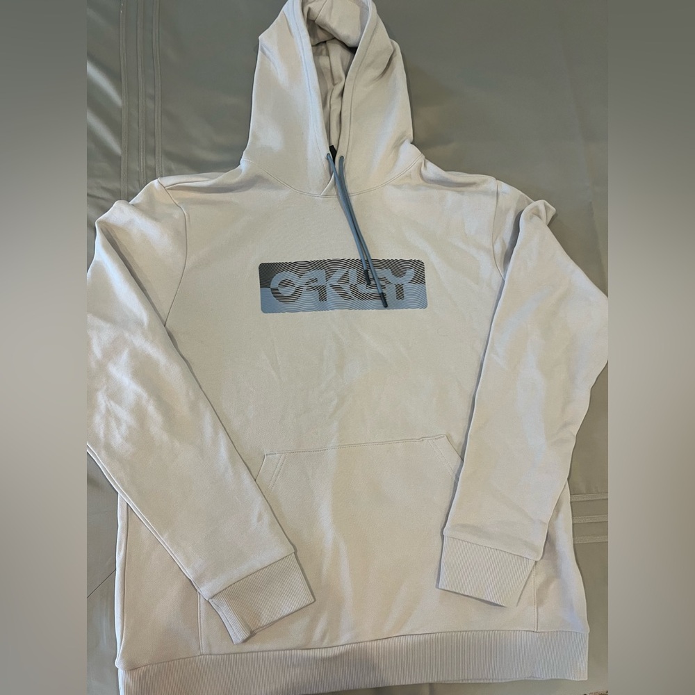 Oakley light gray/light sand colored Hoodie, brand new without tags. Never worn